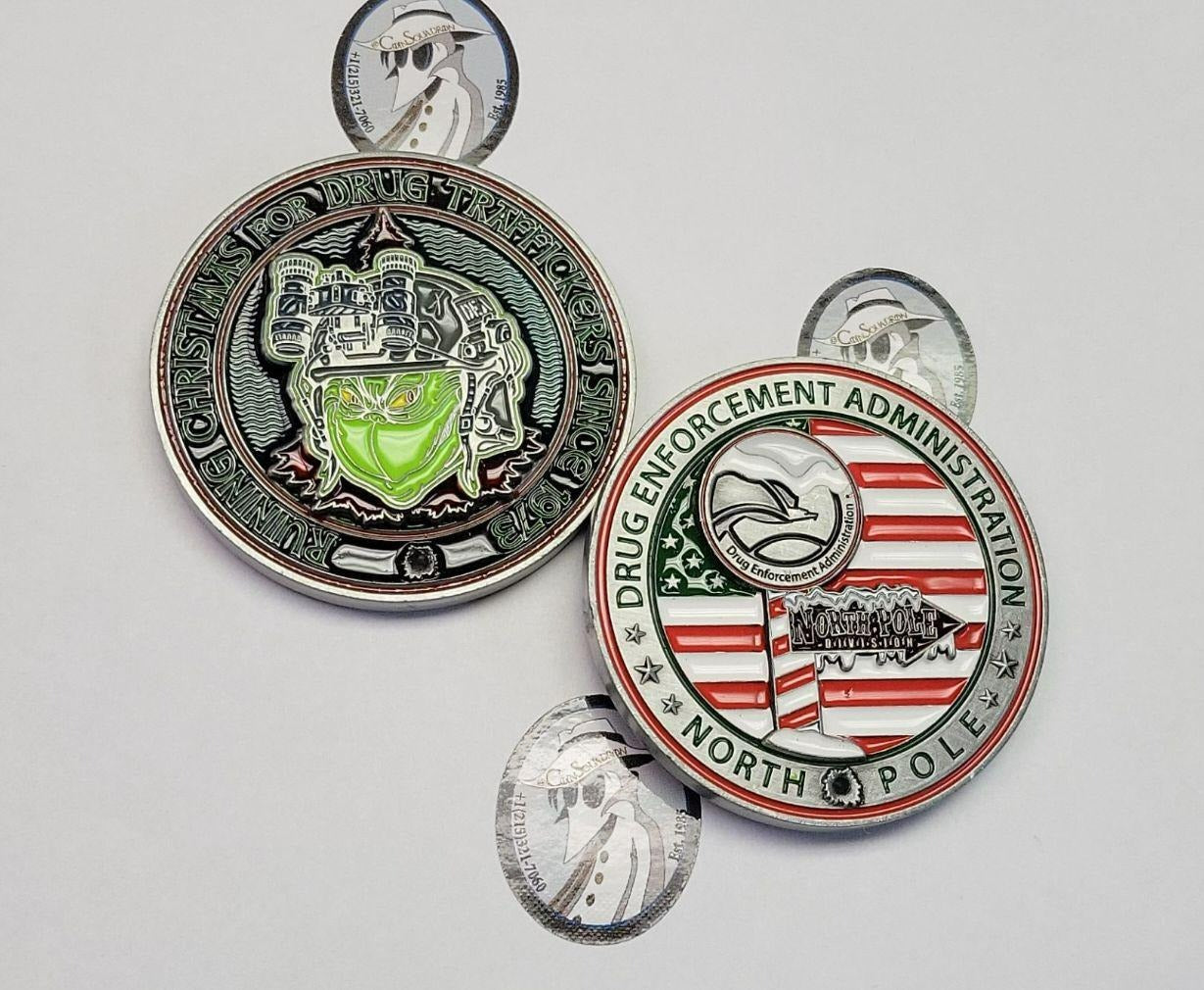 Grinch North Pole and Grinch Atlanta Coin